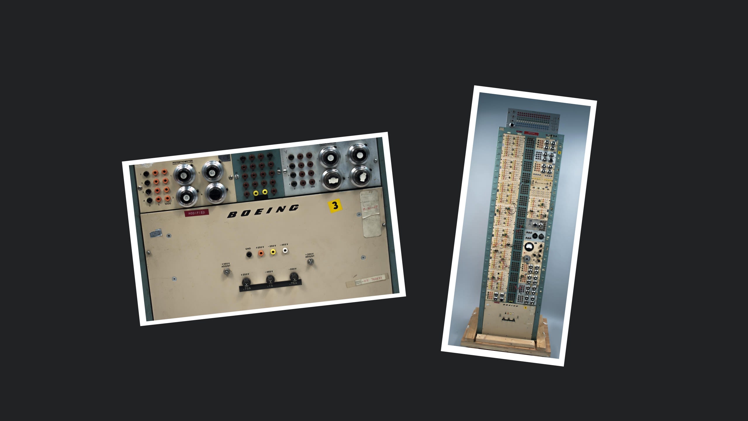 A tall narrow analog computer with many buttons and switches.