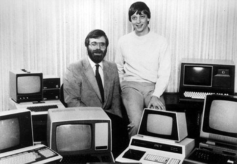 Bill Gates and Paul Allen among many computers.